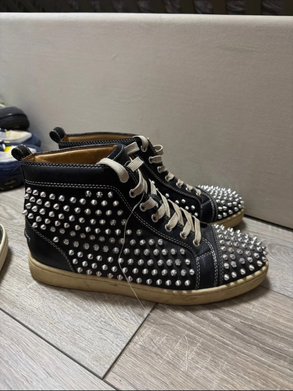 Christian Louboutin Black Leather Spiked High-Top Sneakers - Picture 2 of 4
